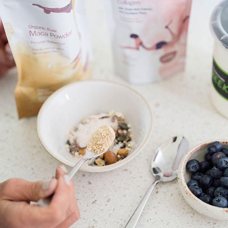 Maca powder used in homemade chocolate bliss balls for a simple snack