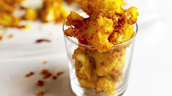 Cheesy Turmeric Cauliflower Popcorn