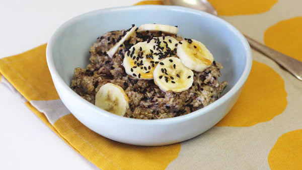 Coconut Quinoa Porridge with Banana & Black Sesame Seeds