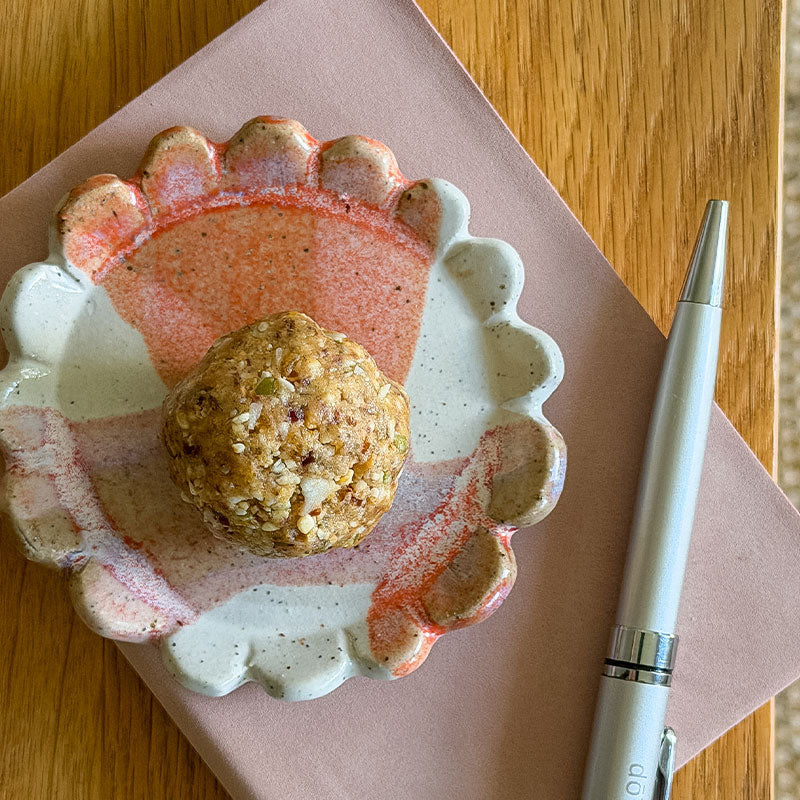 Everyday strength bliss ball on ceramic bowl