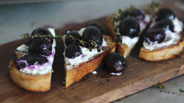 Thyme Roasted Red Grapes on Goats Cheese and Grilled Bread