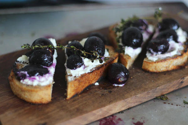 Thyme Roasted Red Grapes on Goats Cheese and Grilled Bread