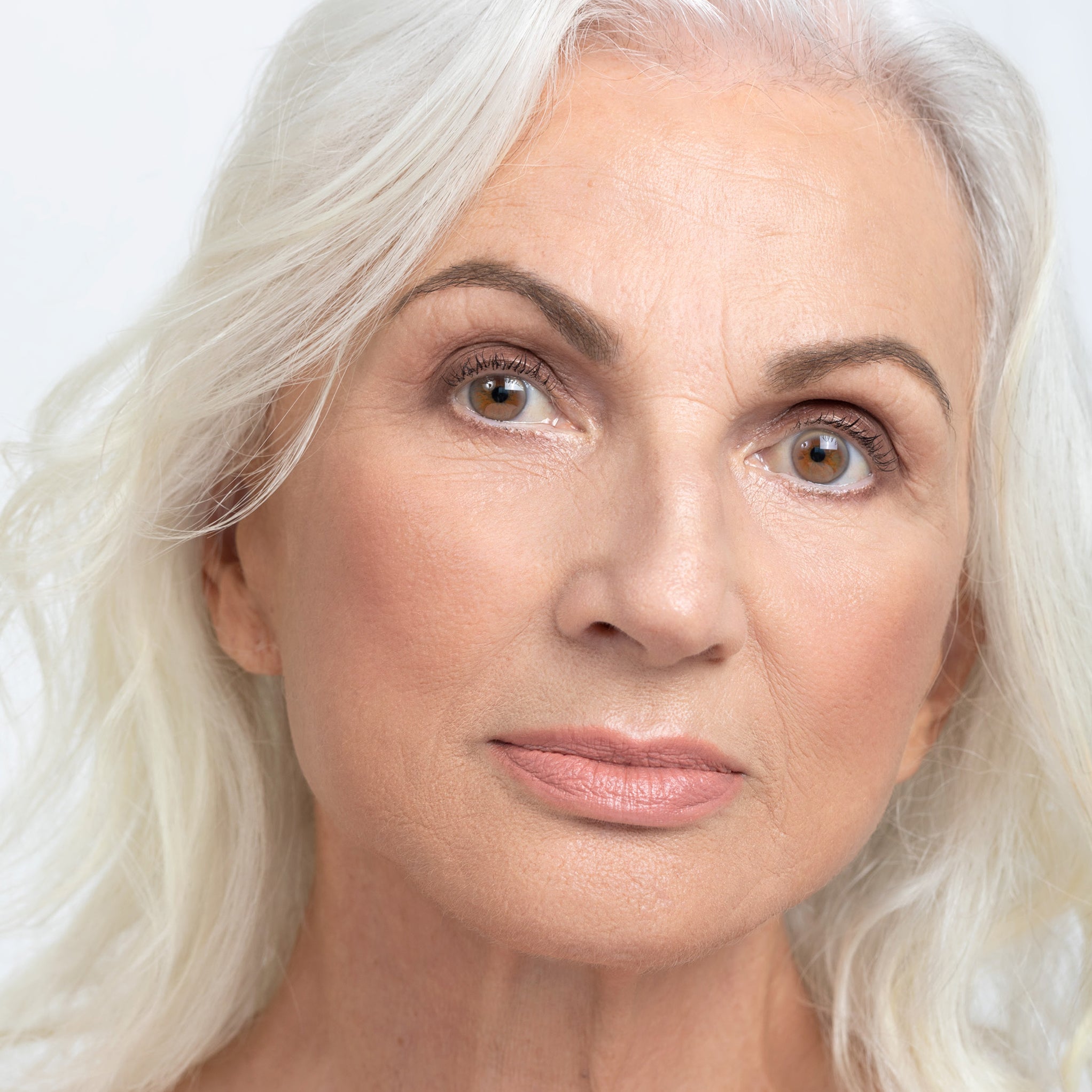 Model wearing Aleph Concealer / Foundation - 2.5 Pink/Light Medium