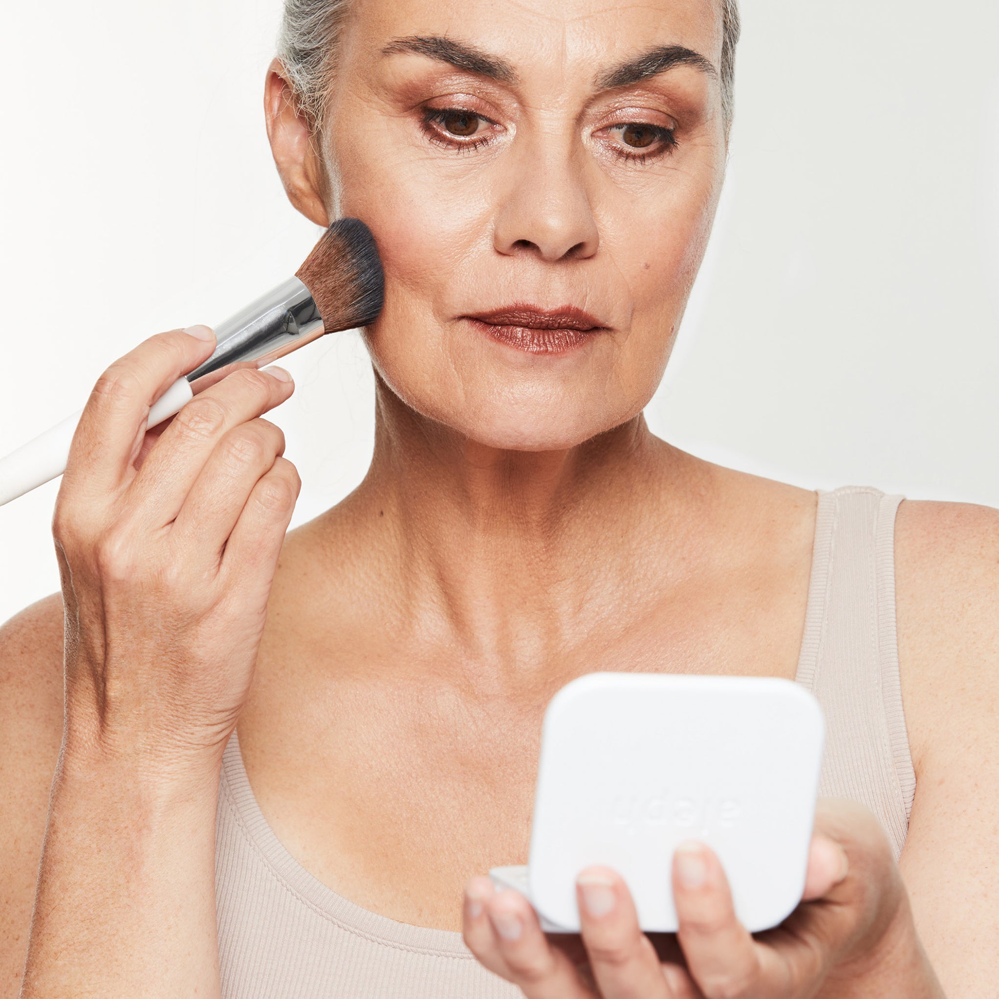 Model wearing Aleph Prep/Finish Powder