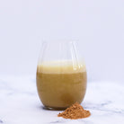 Organic Raw Maca Powder by The Holistic Ingredient dissolved in apple juice