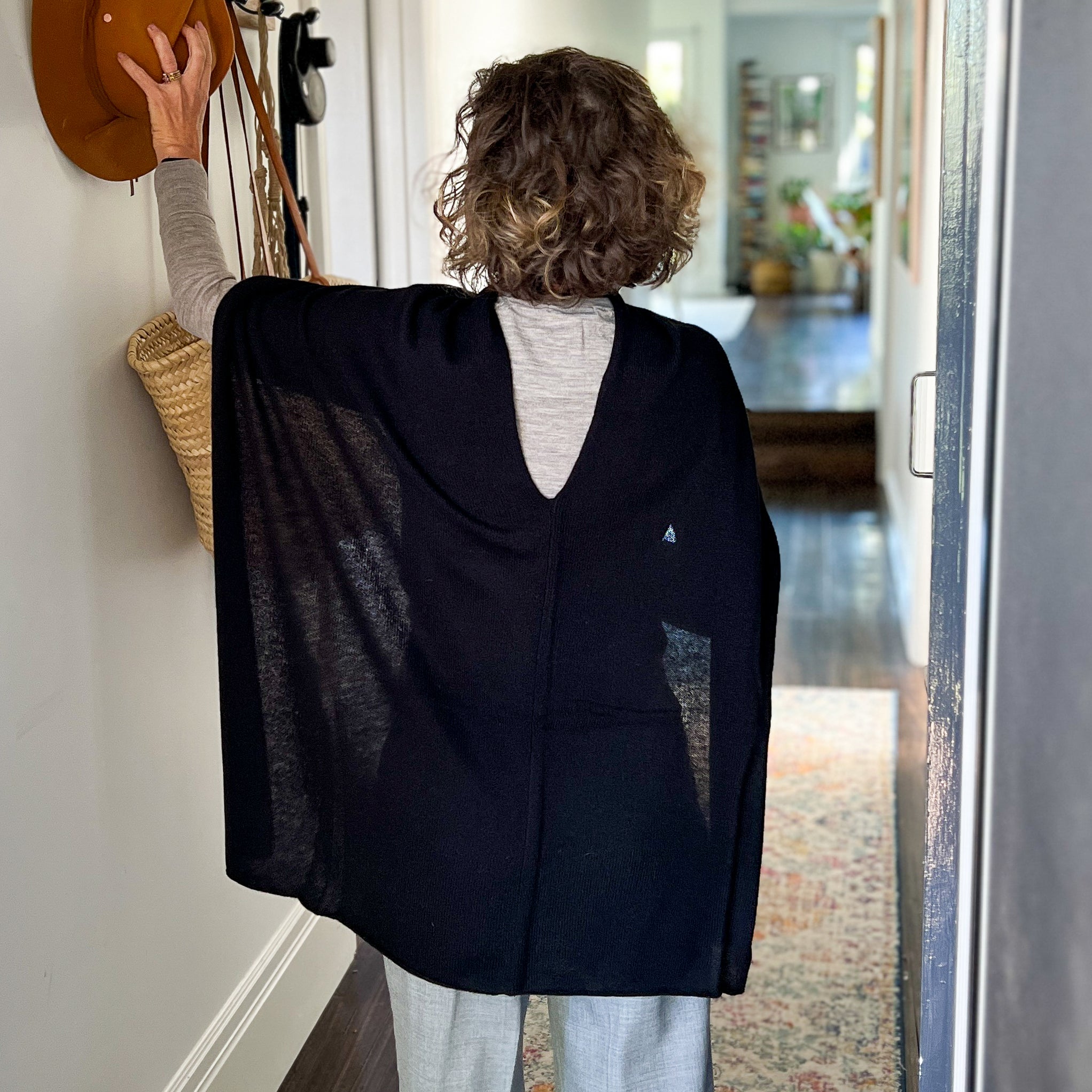 Amy wearing Cashmere Topper in Ebony