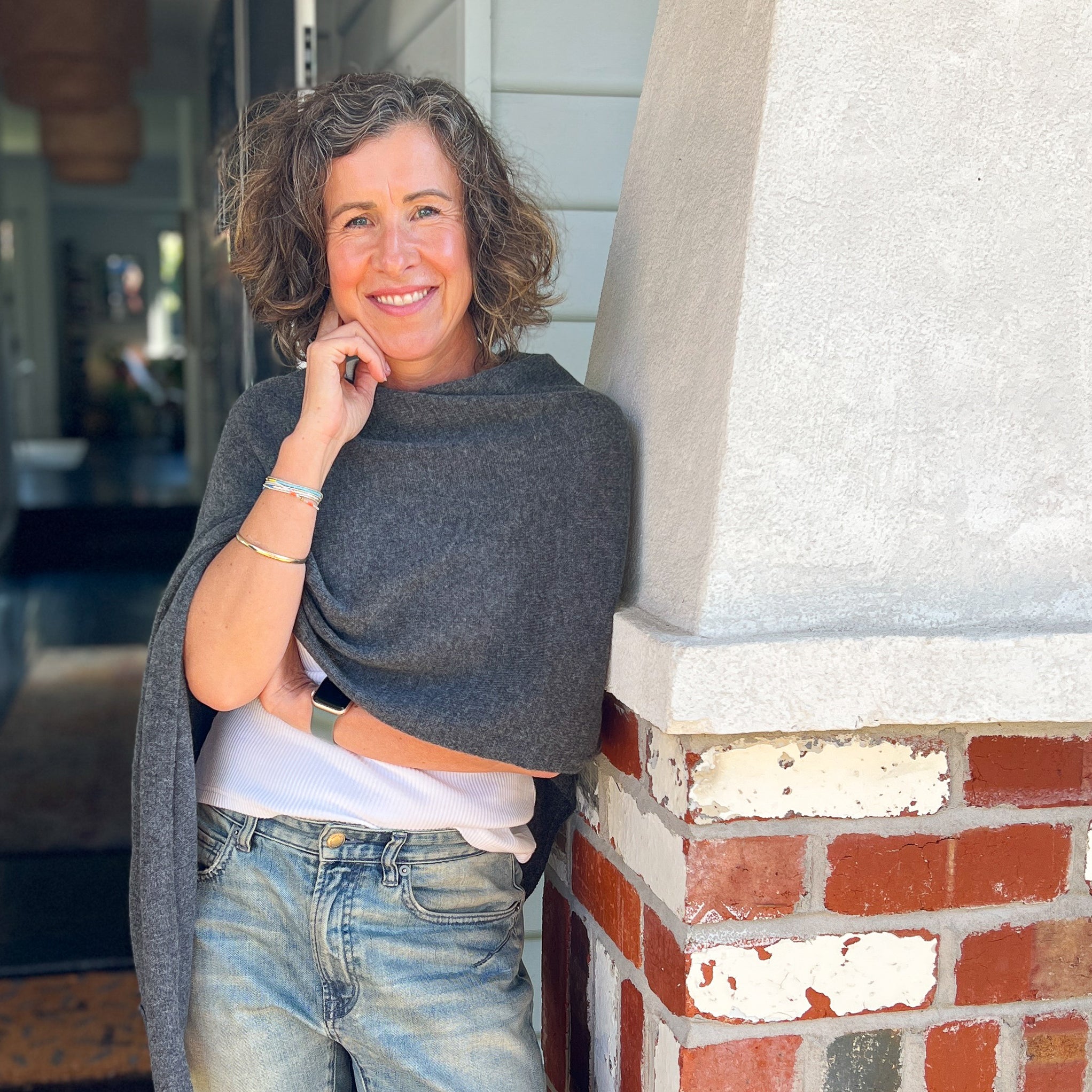 Amy wearing Cashmere Topper in Graphite