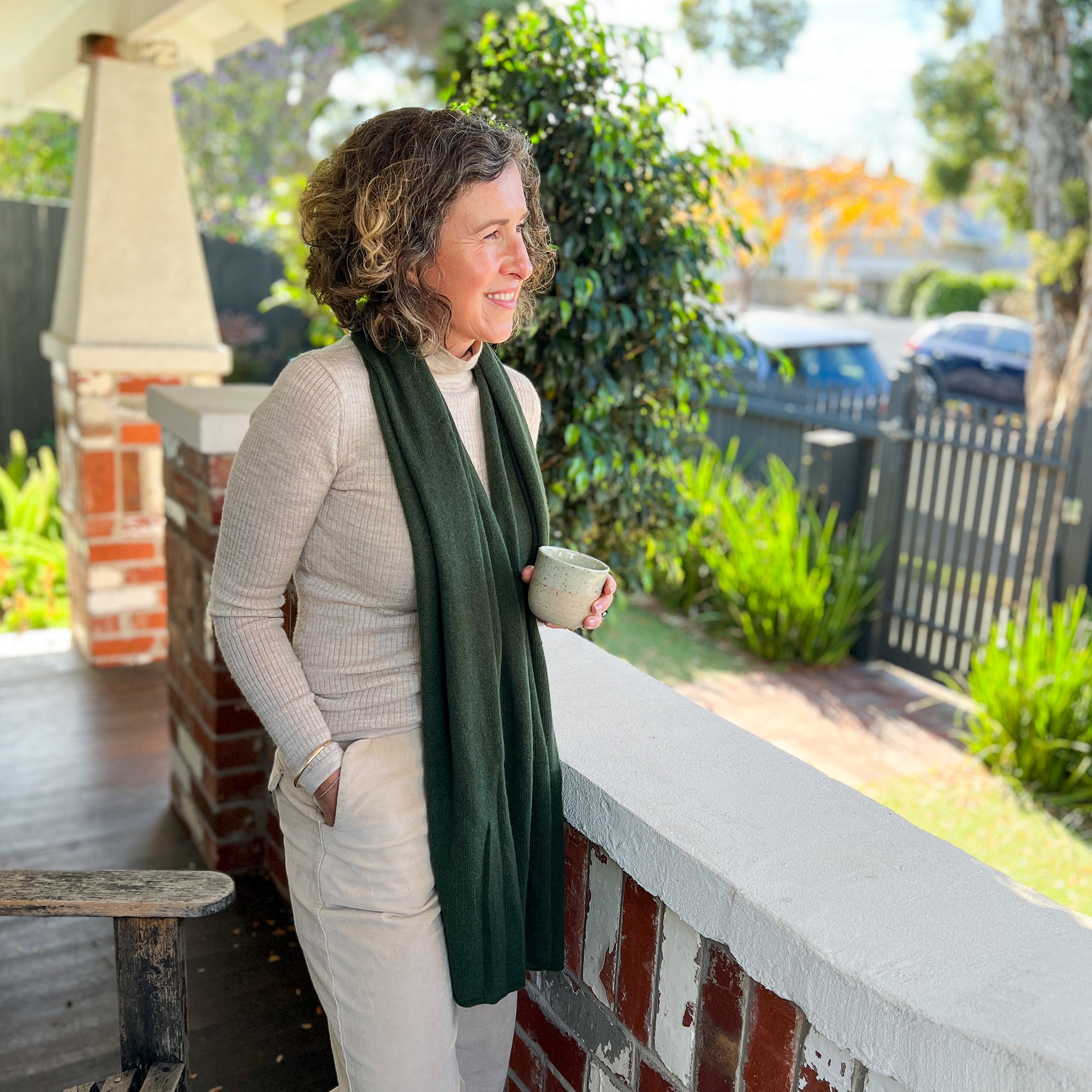 Amy wearing Cashmere Topper in Olive