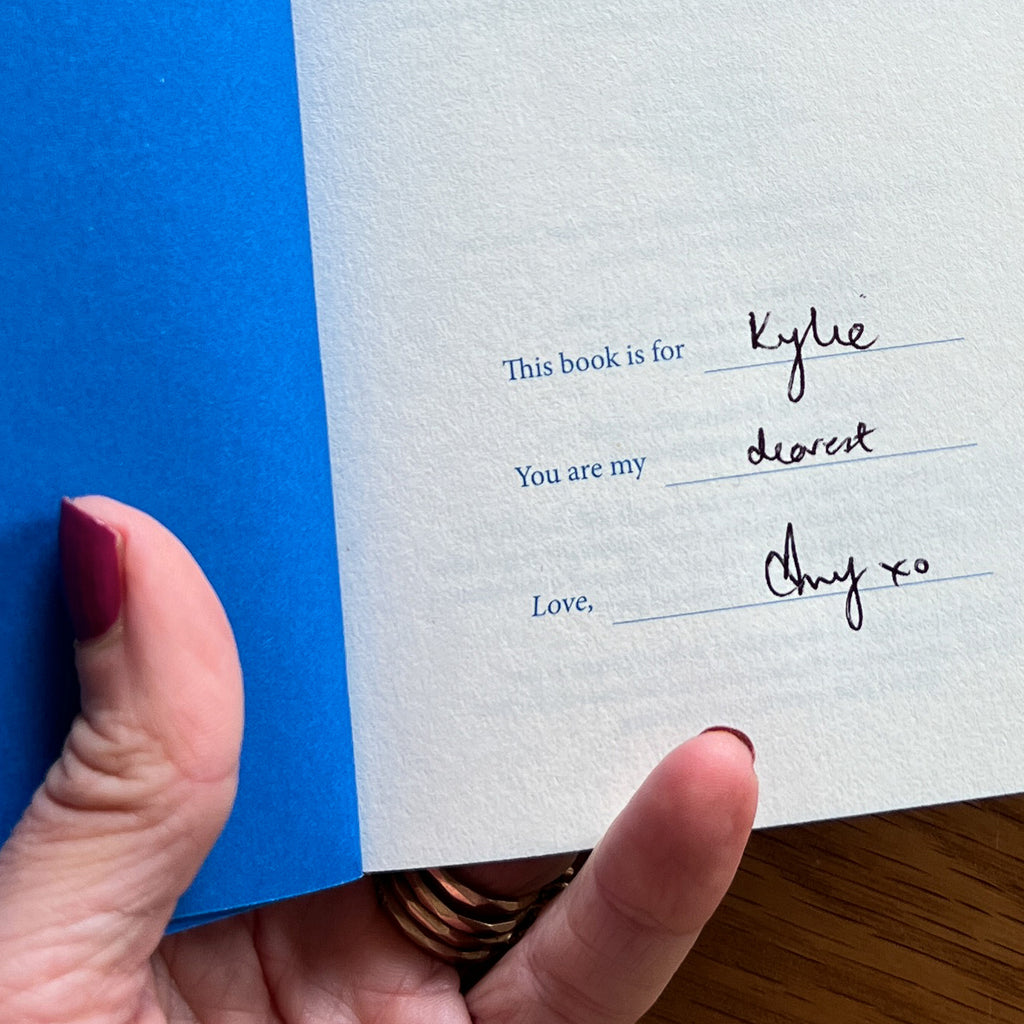 The first page of You + Me by Catie Gett. with a hand-written message by Amy for her friend Kylie.