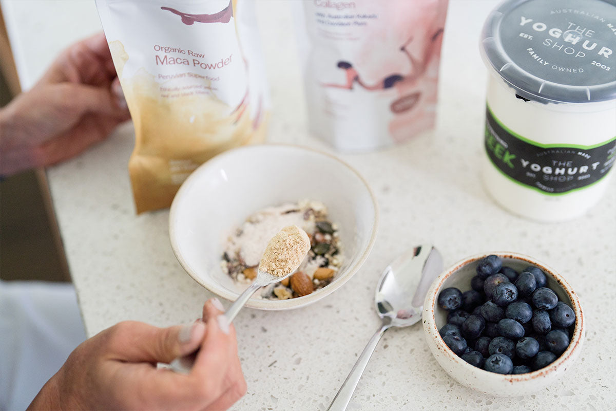 Maca powder used in homemade chocolate bliss balls for a simple snack