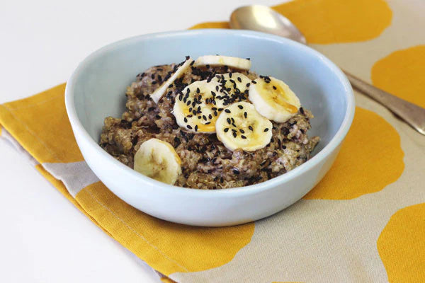 Coconut Quinoa Porridge with Banana & Black Sesame Seeds