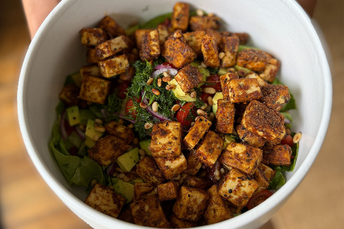 Bowl with spicy crispy tofu salad 