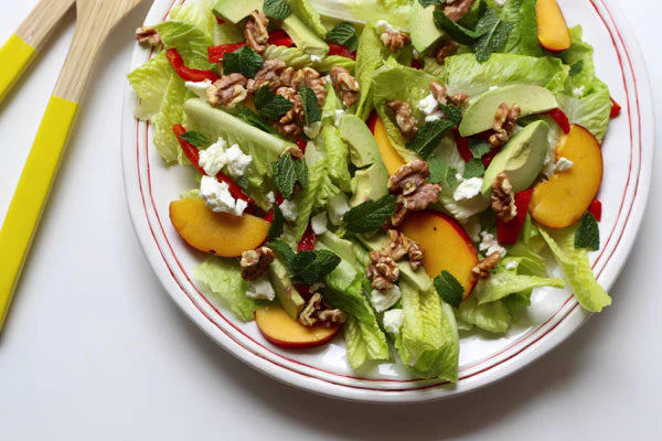 Cos lettuce salad with peach, grilled capsicum and toasted walnuts