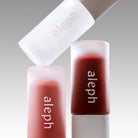 Aleph Aura Gloss in Lumen, Bare and Ember
