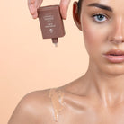 Model wearing Avocado Zinc SPF 50 Physical Bronzing Drops