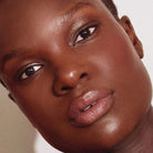 Model wearing Aleph Concealer /  Foundation  8.5 Neutral/Deep