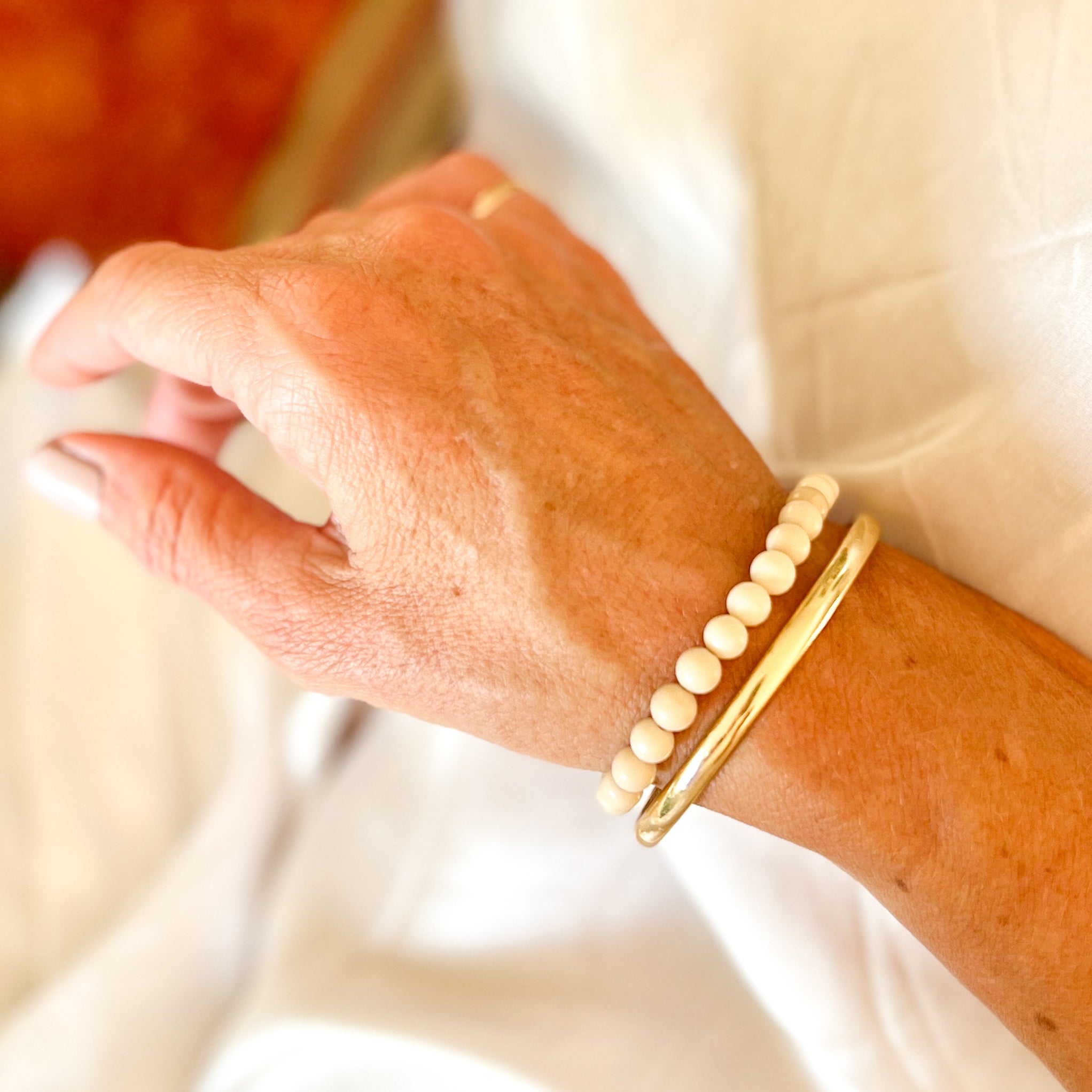 Amy wears a river stone crystal bracelet