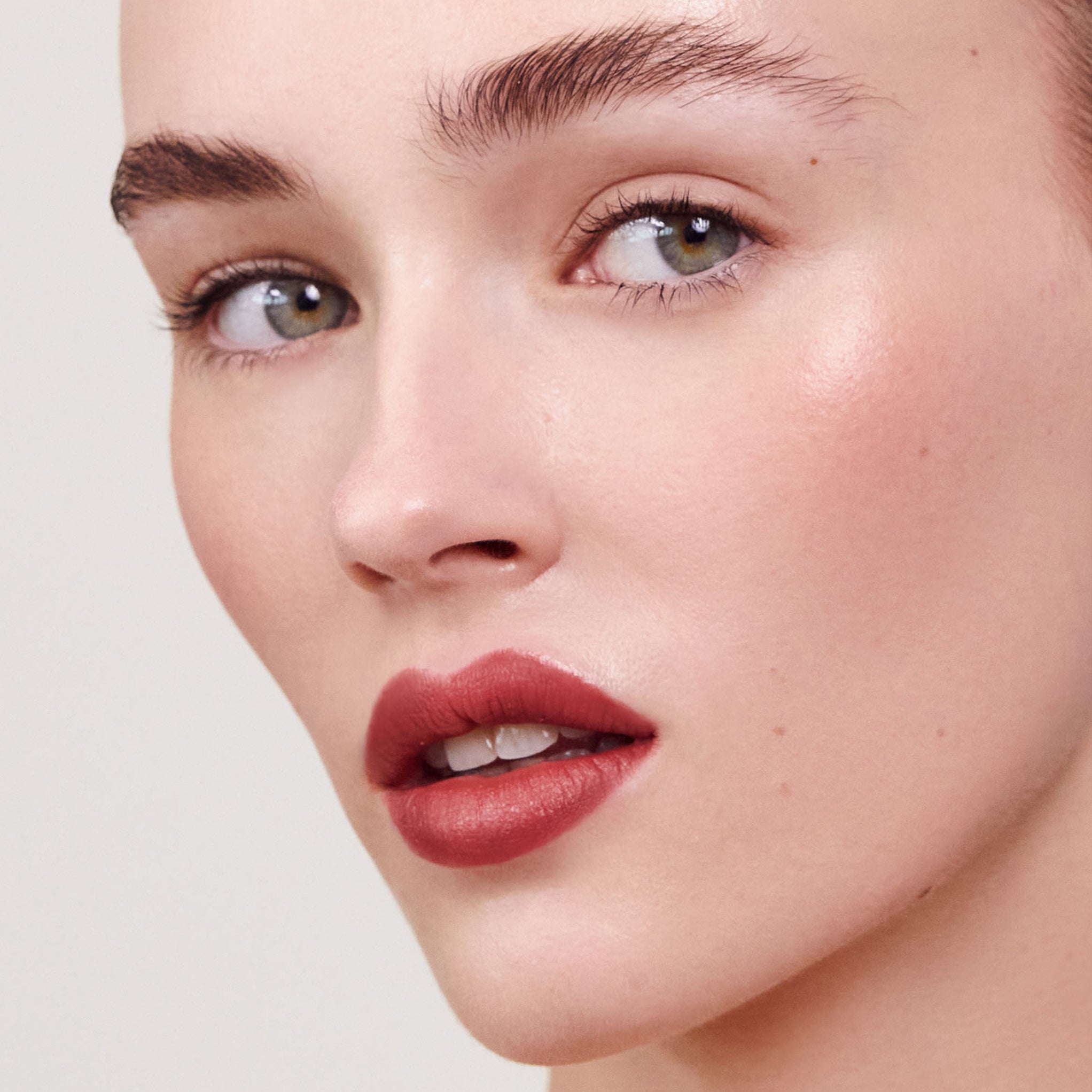 Model wearing Aleph Cheek/Lip Tint: Emanate