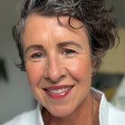 Amy wearing Aleph Aura Gloss: Ember