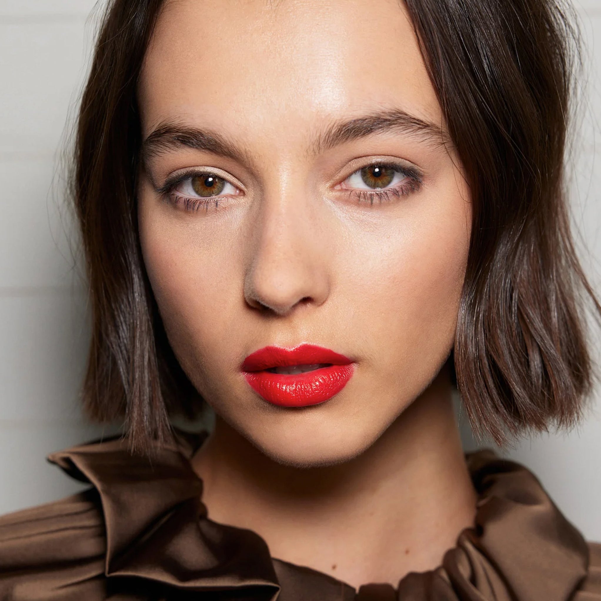 Model wearing Aleph Cheek/Lip Tint: Gloria.