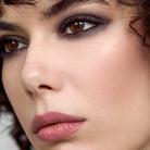 Model wearing Aleph Eye/Lip Multi-Liner: Noir