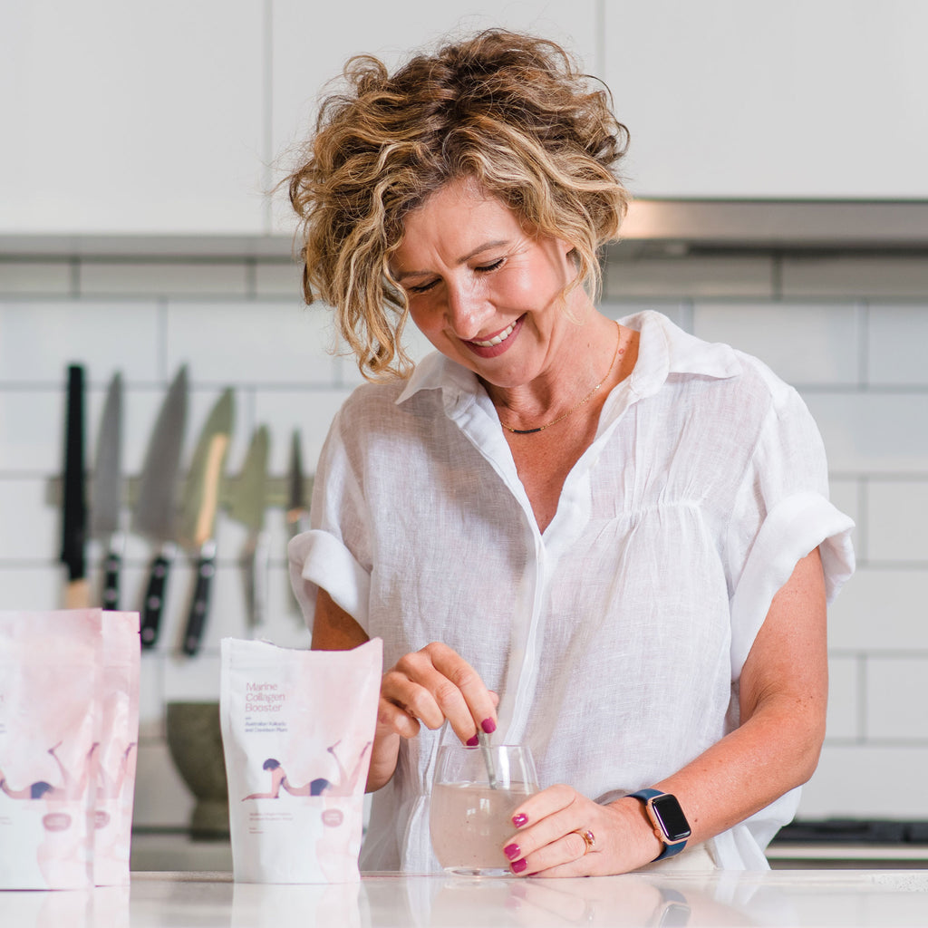 Amy preparing a glass of Marine Collagen with with Australian Kakadu and Davidson Plum