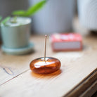 Amber Glass Pebble Incense Holder