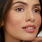 Model wearing Aleph Cheek/Lip Tint: Pixie