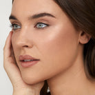 Model wearing Aleph Radiance Balm Sun