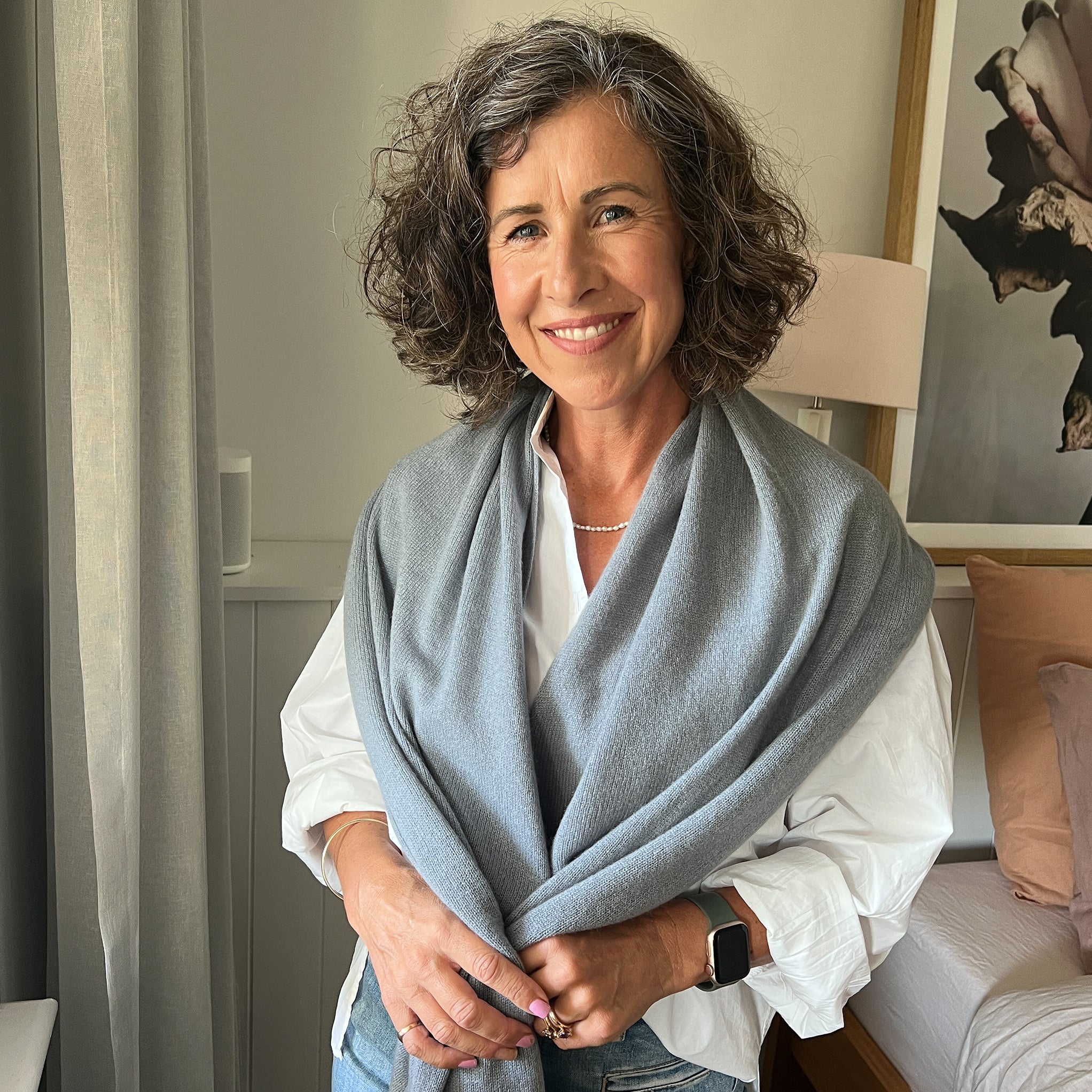 Amy wearing a Cashmere Topper in Sterling