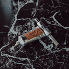 Two tubes of deodorant on a marble surface
