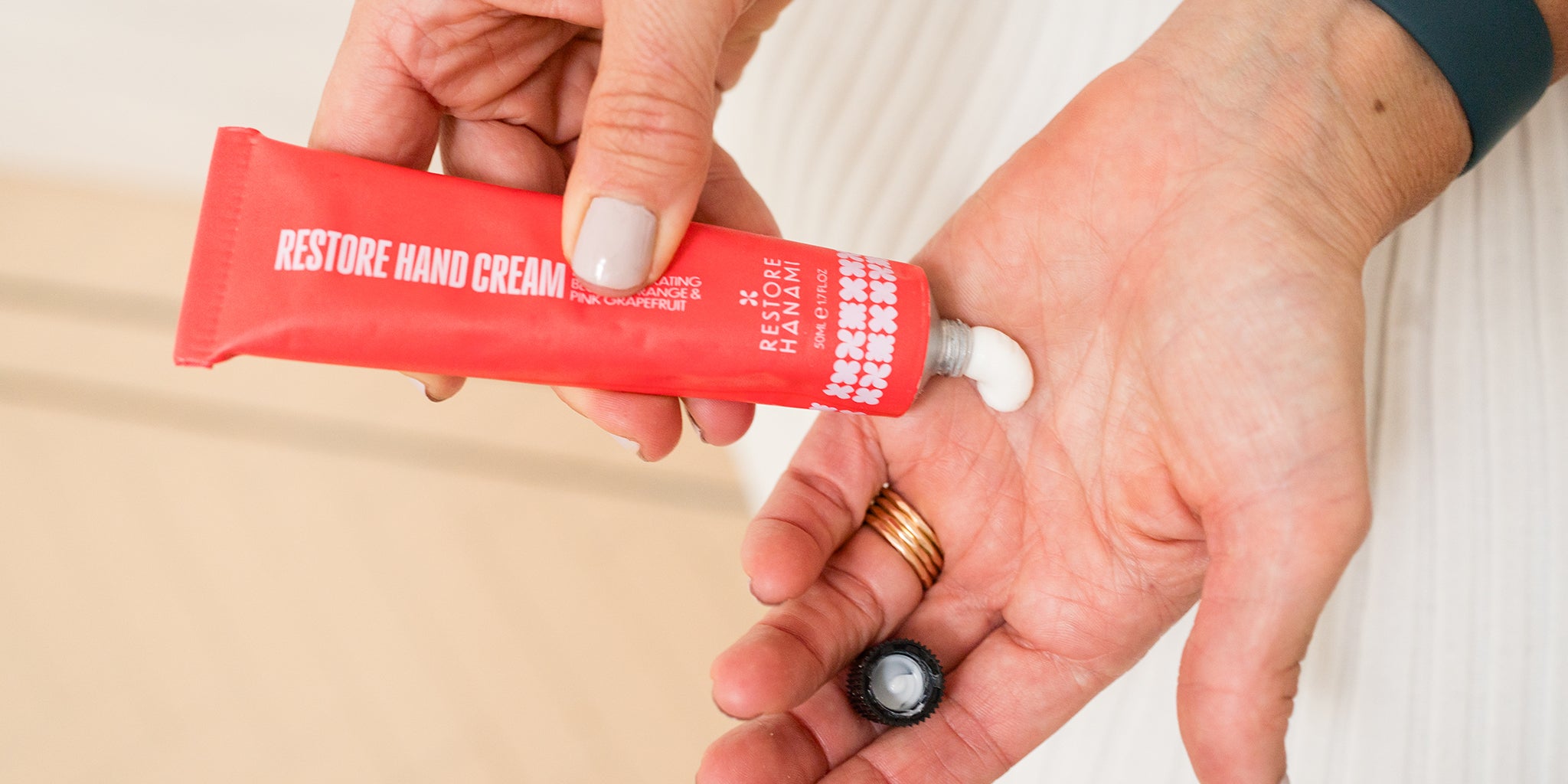 Amy applying Hanami Retstore Hand Cream