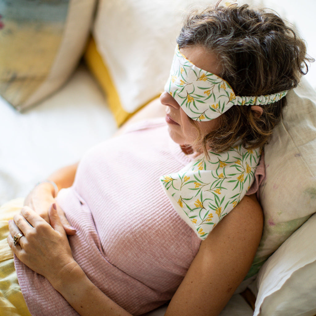 Amy wearing the Wattle Eye Mask and Heat Pack